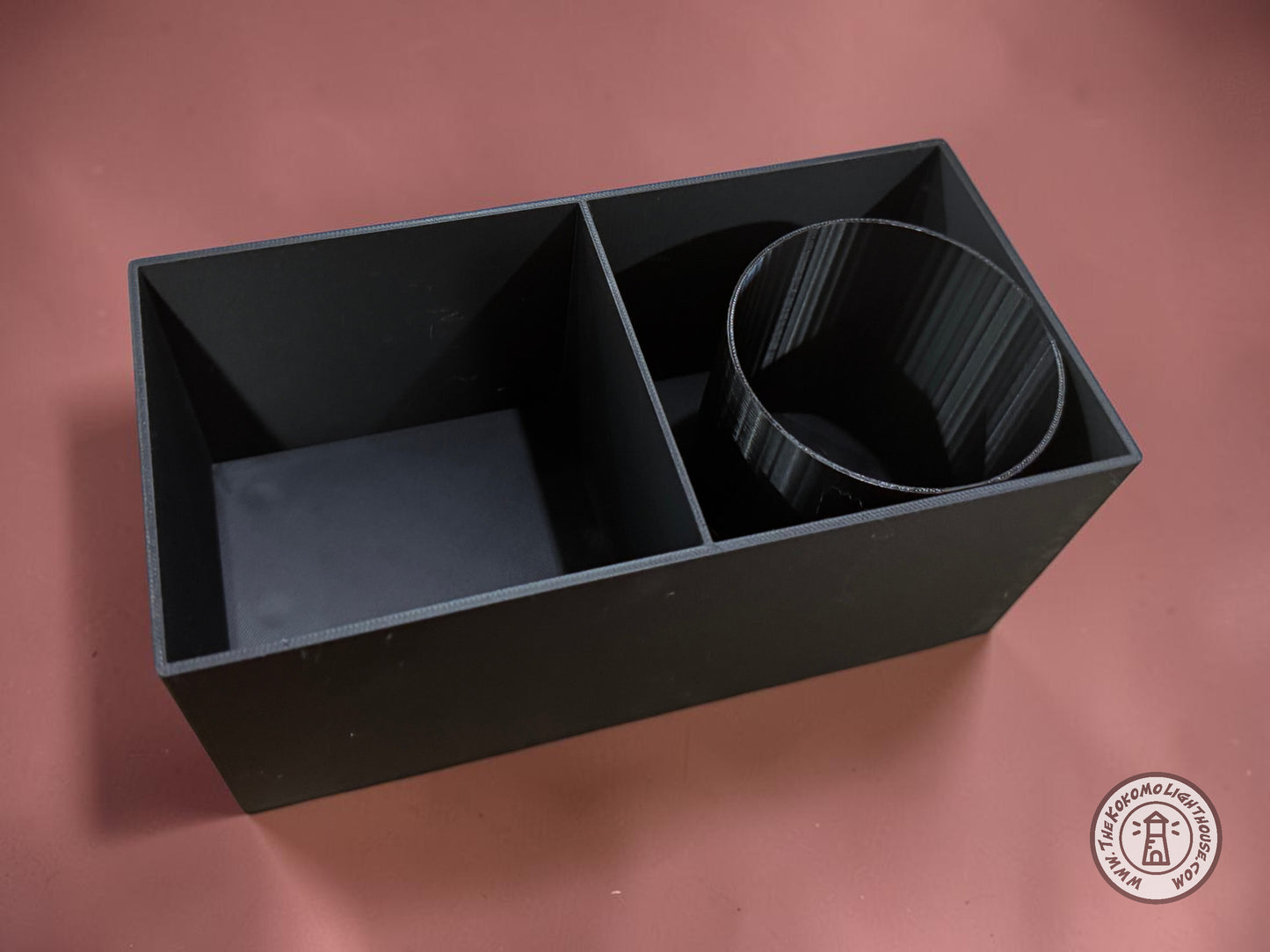 An empty fork truck caddy showing a regular/bottle insert on a maroon background.
