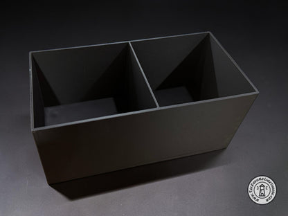 An empty fork truck caddy showing it without a drink holder on a dark gray background.