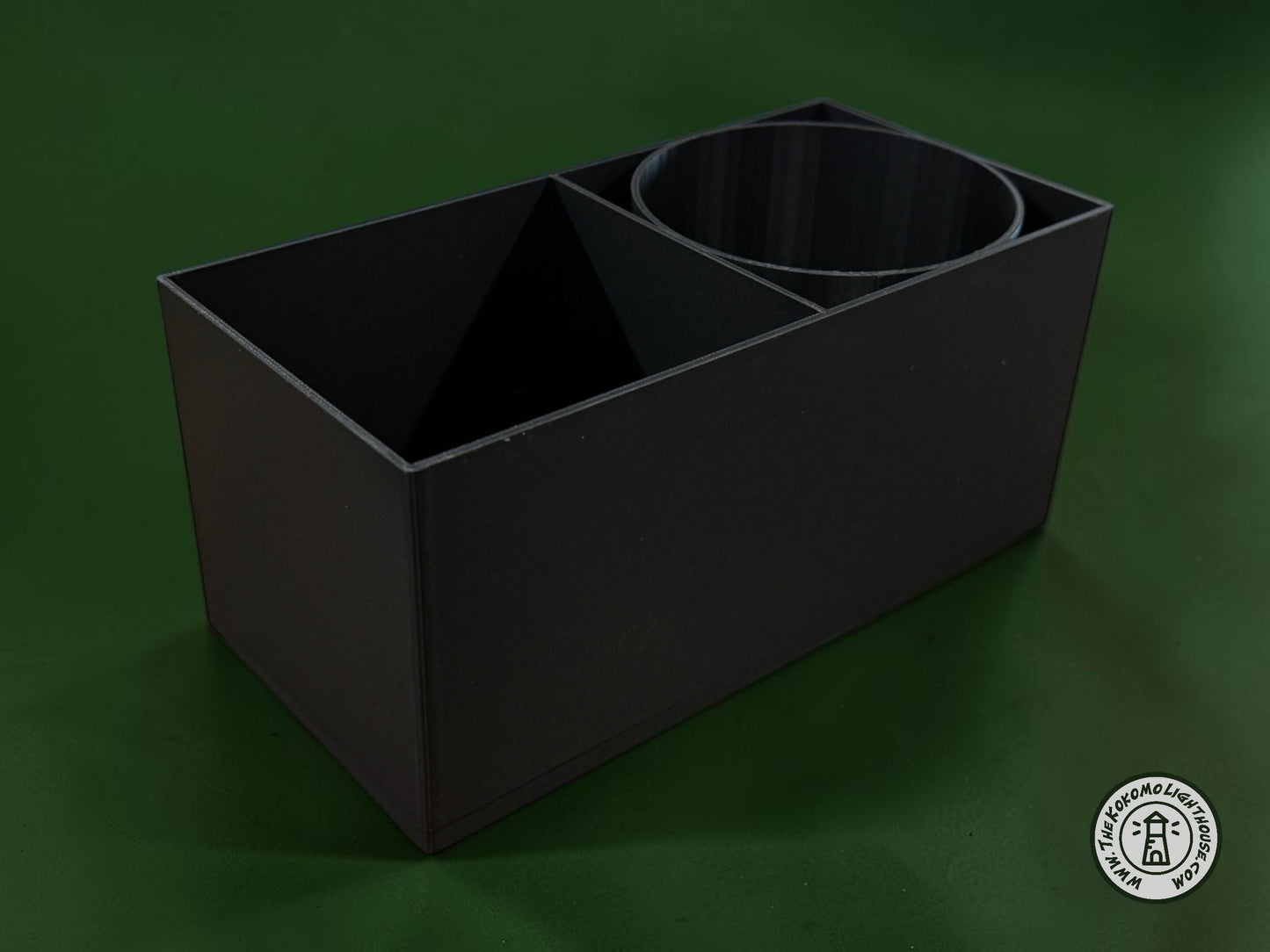 An empty fork truck caddy showing a shaker bottle insert on a green background.