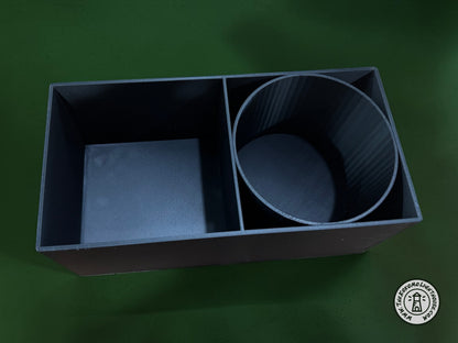 An empty fork truck caddy showing a shaker bottle insert on a green background.