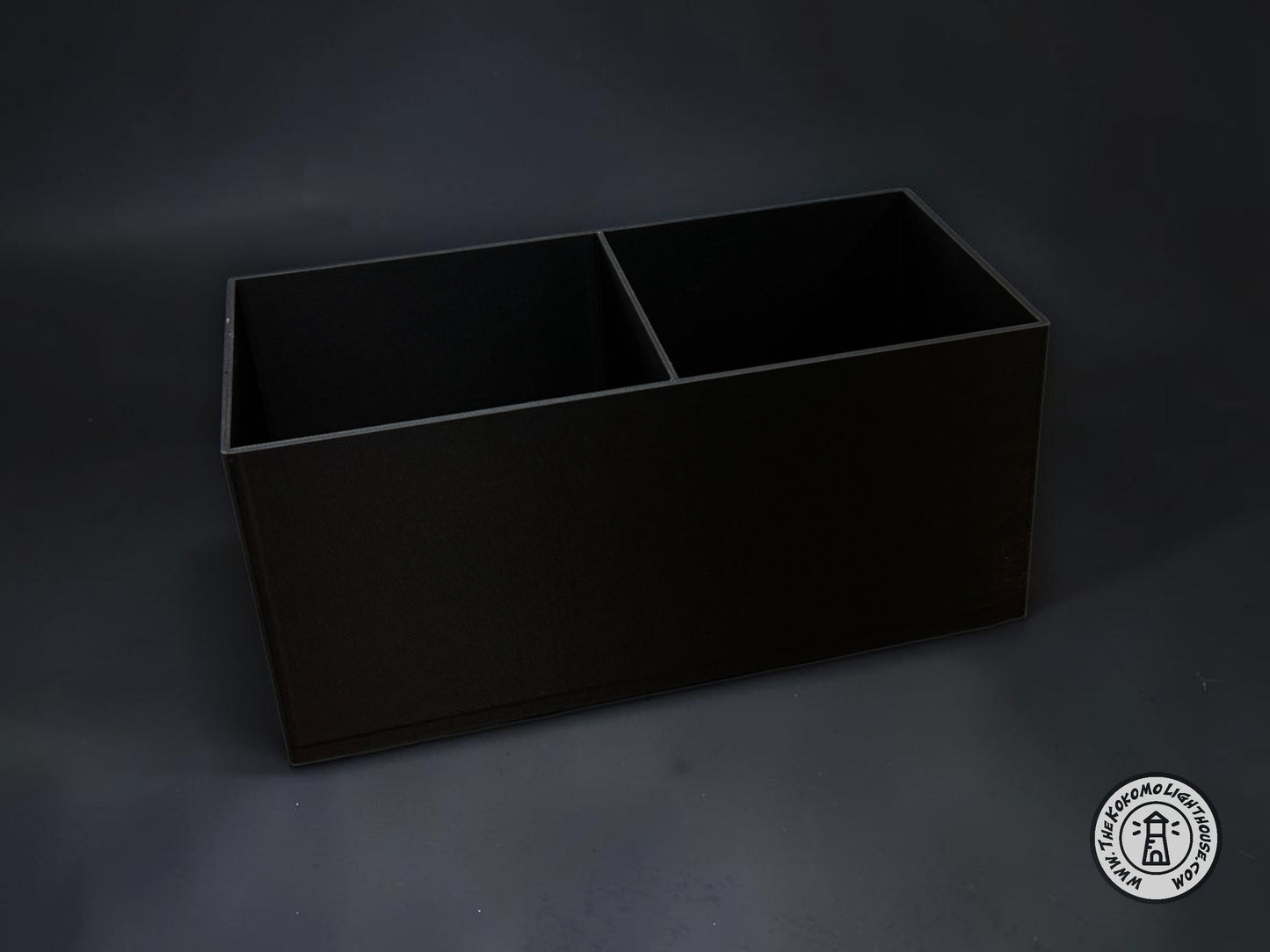 An empty fork truck caddy showing it without a drink holder on a dark gray background.