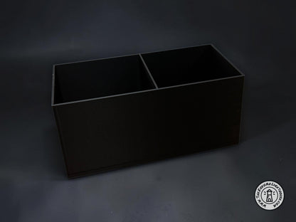 An empty fork truck caddy showing it without a drink holder on a dark gray background.