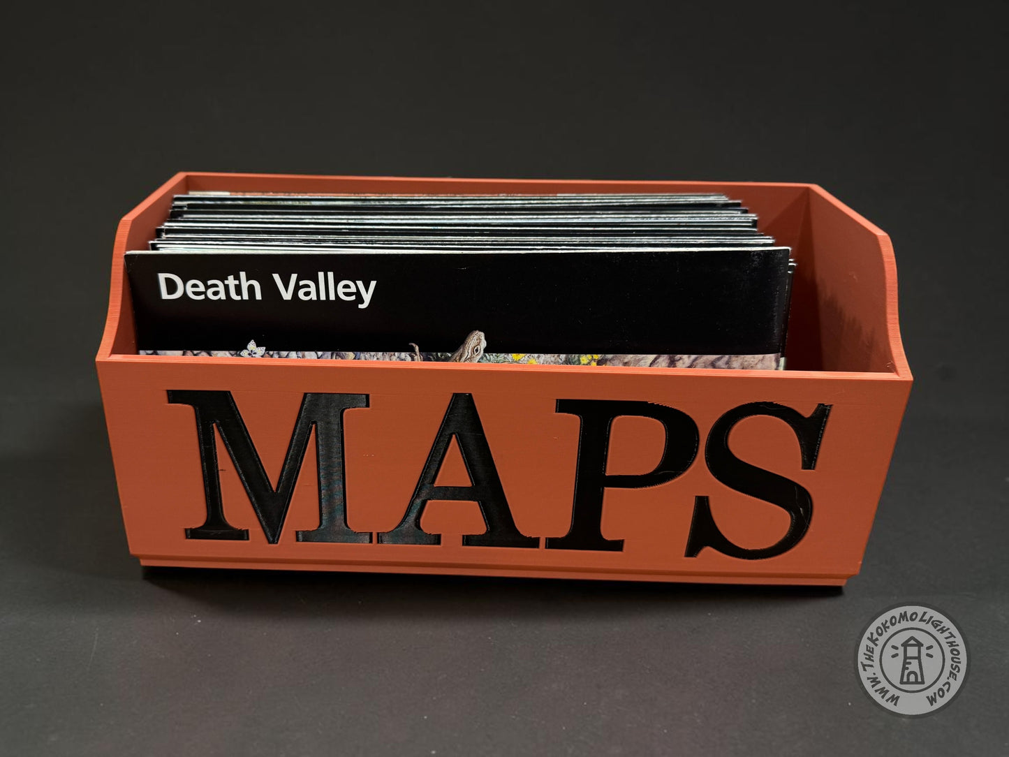Dual Tone Terra Cotta with black lettering NatGeo Map Box holding unigrids