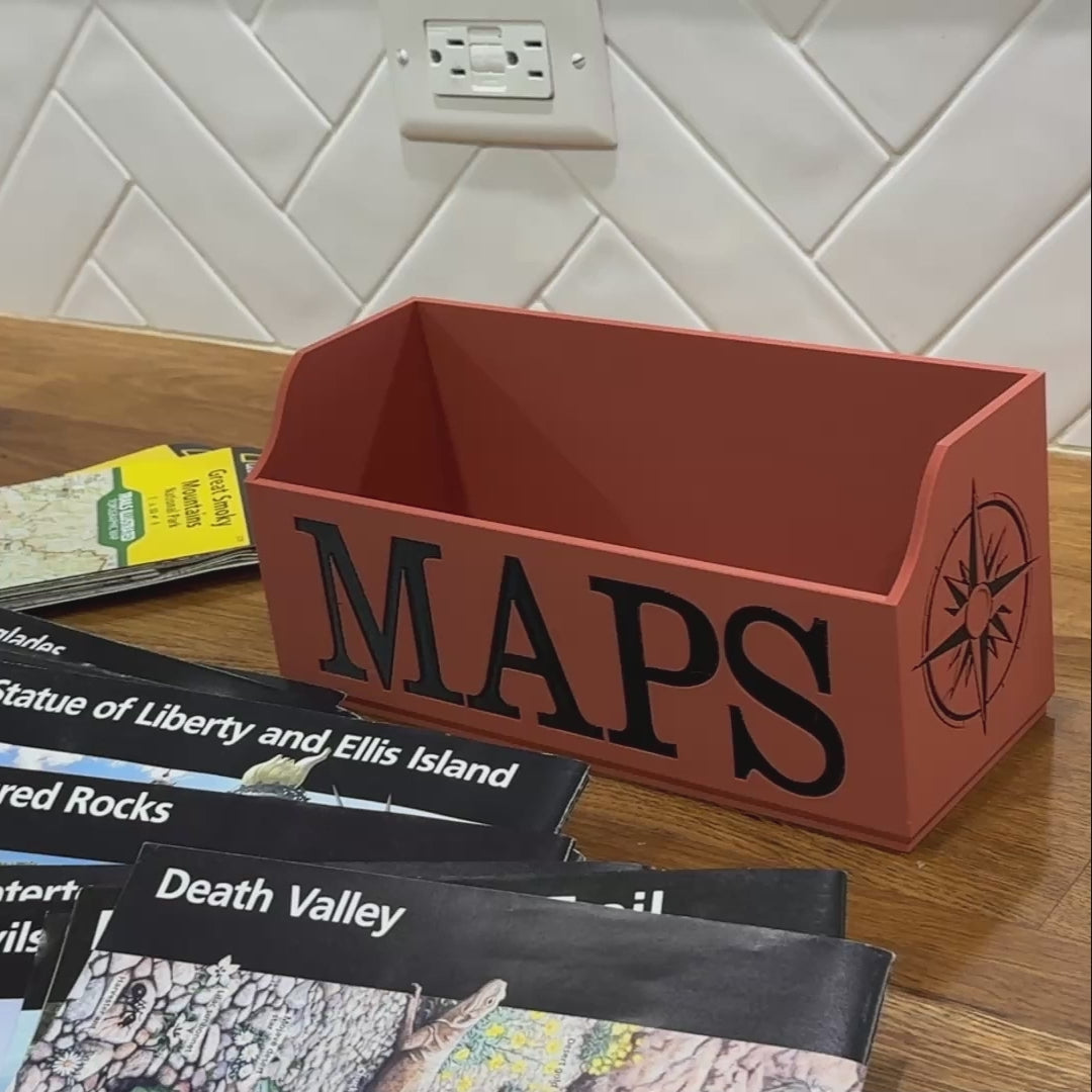 Terra Cotta Map Box being loaded with maps